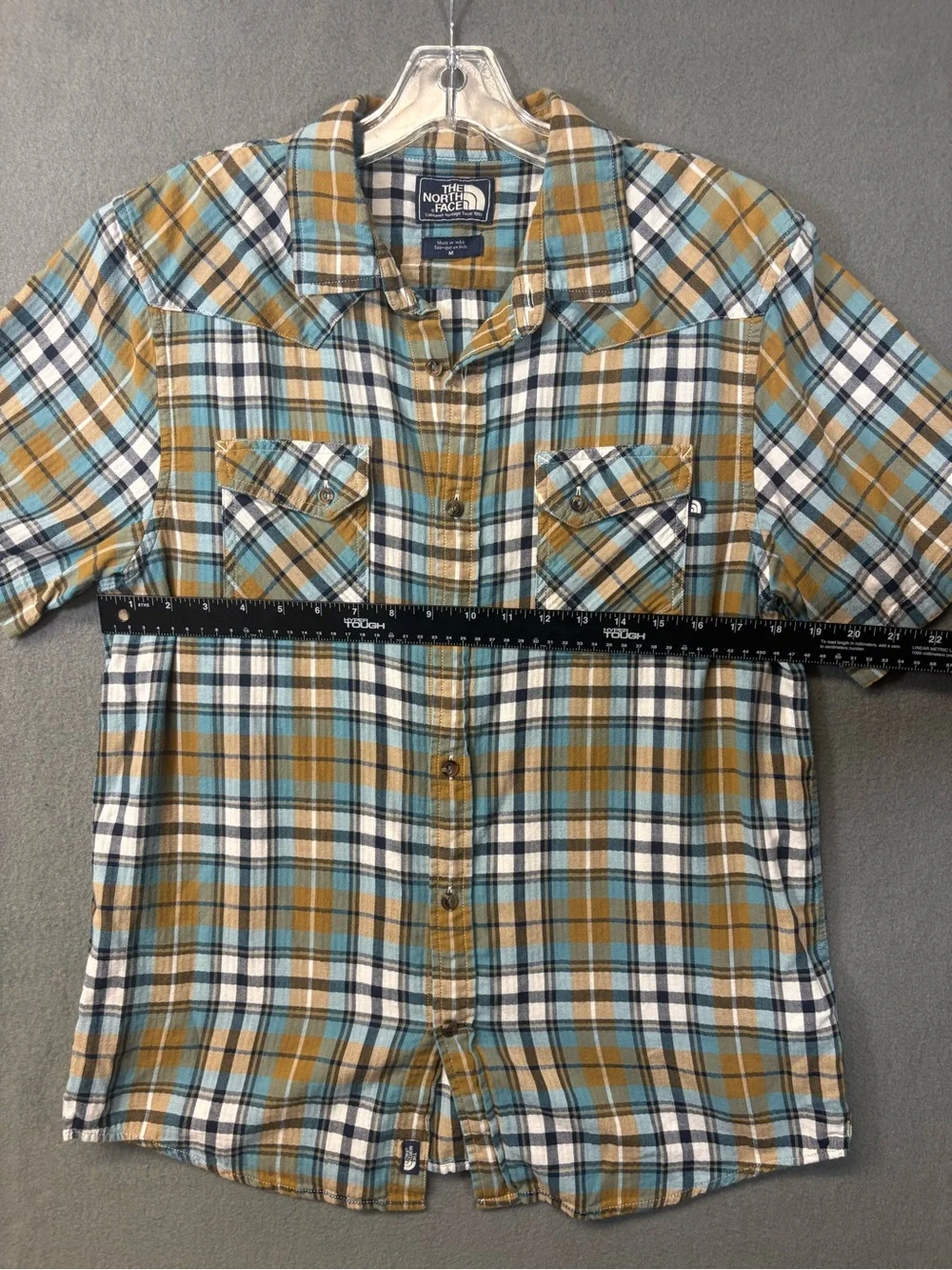 The North Face Men’s cotton multicolor plaid short-sleeve button-up shirt Sz. M